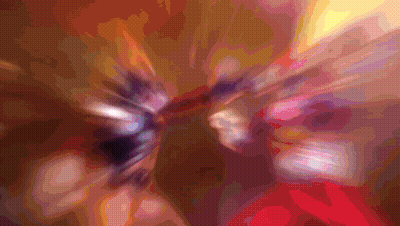 A Blurry Picture Of A Person 'S Face With A Purple And Orange Background GIF