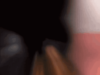A Blurry Picture Of A Person 'S Face With A Red And White Background GIF