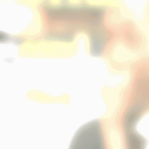 A Blurry Picture Of A Person 'S Face With A Yellow Arrow Pointing To The Right GIF