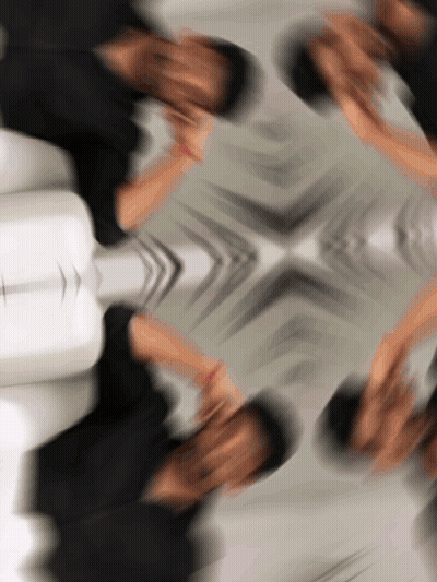 A Blurry Picture Of A Person 'S Face With Arrows Pointing To The Left GIF