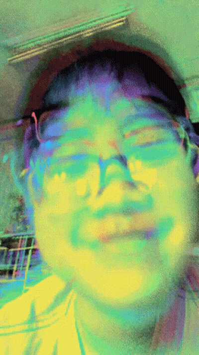 A Blurry Picture Of A Person 'S Face With Glasses On GIF