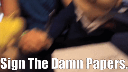 A Blurry Picture Of A Person Signing A Document That Says Sign The Damn Papers GIF