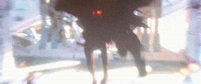 A Blurry Picture Of A Person Standing In A Room GIF