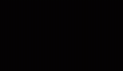 A Blurry Picture Of A Person Standing In Front Of A Door With A Light Coming Out Of It . GIF