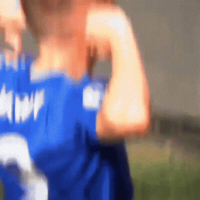 A Blurry Picture Of A Person Wearing A Blue Jersey That Says Mvp On It GIF