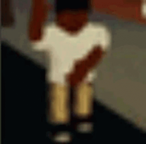 A Blurry Picture Of A Person Wearing A White Shirt And Brown Shorts . GIF