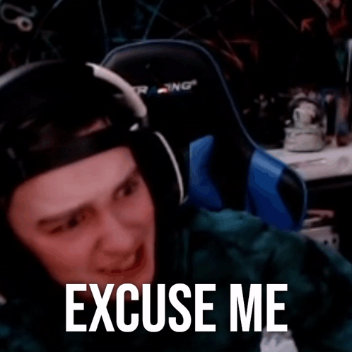 A Blurry Picture Of A Person With Headphones And The Words `` Excuse Me '' Written On It . GIF