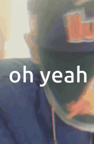 A Blurry Picture Of A Person With The Words Oh Yeah Written In White GIF