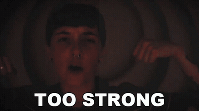 A Blurry Picture Of A Person With The Words Too Strong Below Them GIF