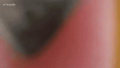 A Blurry Picture Of A Red And Black Background With The Word Wendy Written On The Bottom . GIF