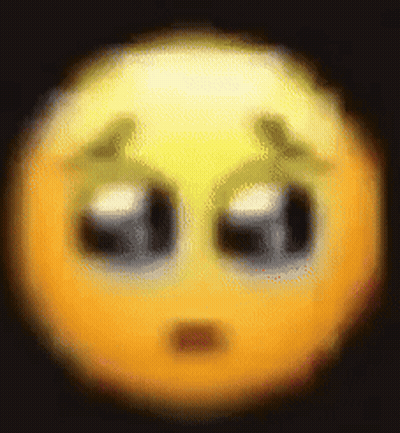 A Blurry Picture Of A Smiley Face With A Sad Look On It . GIF