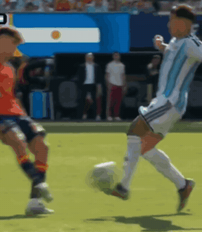 A Blurry Picture Of A Soccer Game With A Flag In The Background That Says ' Argentina ' GIF