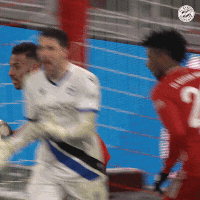 A Blurry Picture Of A Soccer Game With The Number 2 On The Back Of A Player 'S Jersey GIF