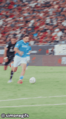 A Blurry Picture Of A Soccer Game With The Words @Simonegifs On The Bottom GIF