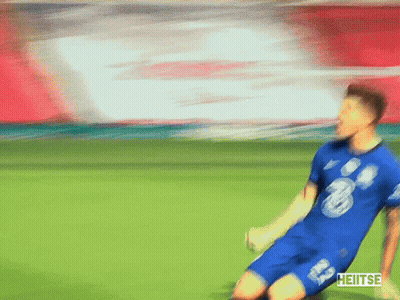 A Blurry Picture Of A Soccer Player Wearing A Blue Shirt With The Number 20 On It GIF