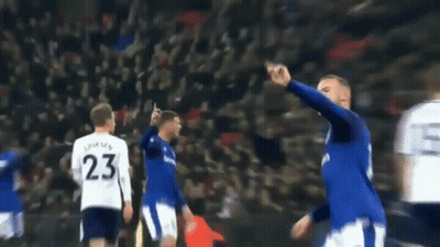A Blurry Picture Of A Soccer Player Wearing Number 23 GIF