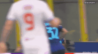 A Blurry Picture Of A Soccer Player Wearing Number 9 GIF
