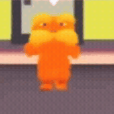 A Blurry Picture Of A Teddy Bear With A Mustache Standing In Front Of A Phone . GIF