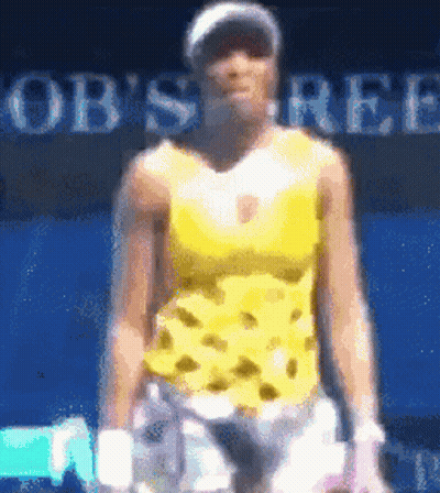 A Blurry Picture Of A Tennis Player In Front Of A Sign That Says Bob 'S Ree GIF