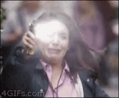 A Blurry Picture Of A Woman Wearing Headphones With The Website 4Gifs.com In The Lower Right Corner GIF