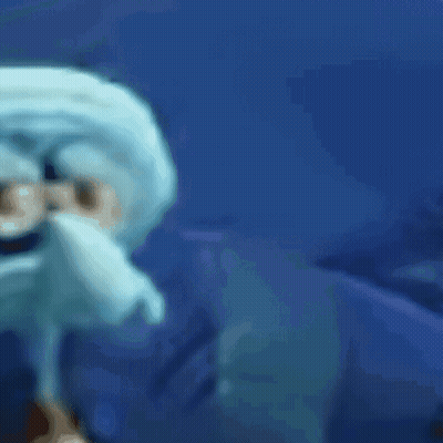 A Blurry Picture Of Squidward From Spongebob Squarepants With Glasses On GIF
