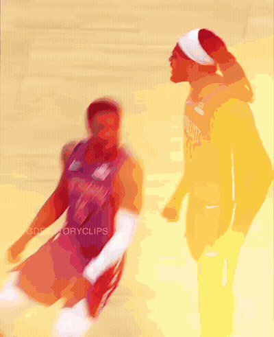 A Blurry Picture Of Two Basketball Players With One Wearing A Jersey That Says ' Miami ' On It GIF