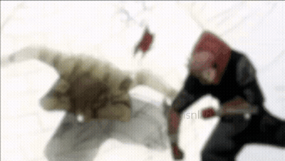 A Blurry Picture Of Two People Standing Next To Each Other . GIF