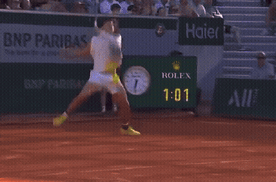 A Bnp Paribas Ad Can Be Seen In The Background Of A Tennis Match GIF