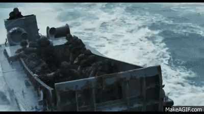 A Boat Filled With Soldiers Is Floating In The Ocean . GIF