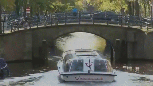 A Boat That Says Holland International On The Back Of It GIF