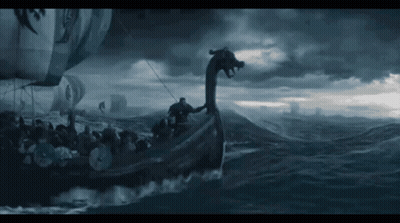 A Boat With A Dragon 'S Head On The Back Of It GIF