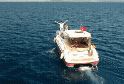 A Boat With The Word Akkas On The Side Of It GIF