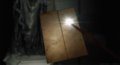 A Book Is Open To A Page That Says ' Cations.tumblr ' On It GIF