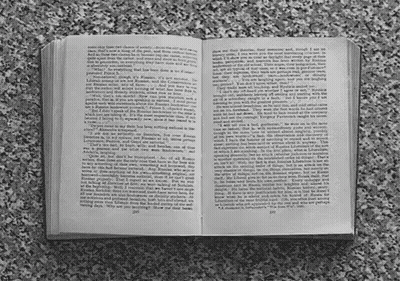 A Book Is Open To A Page That Says ' I 'M Sorry ' On It GIF