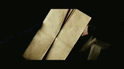 A Book Is Open To A Page That Says Marauders Map On It GIF