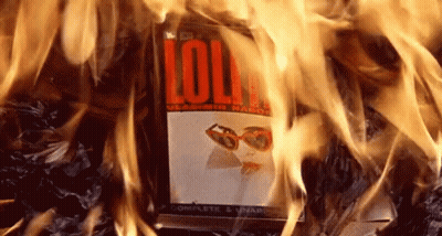 A Book That Is Burning With The Word Lolly On It GIF
