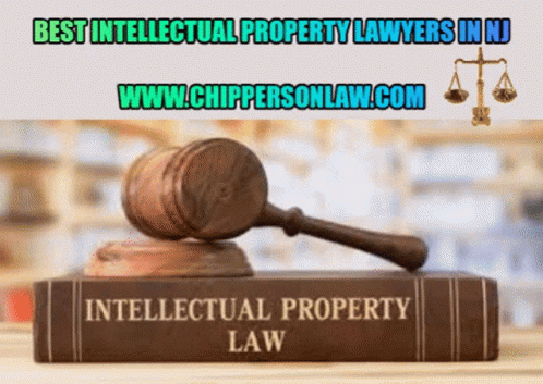 A Book Titled Intellectual Property Law With A Gavel On Top GIF