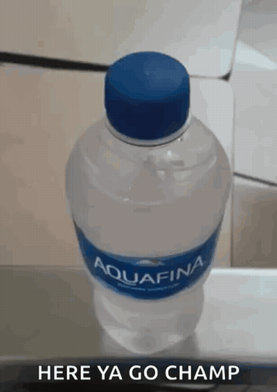 A Bottle Of Aquafina Water With A Blue Cap GIF
