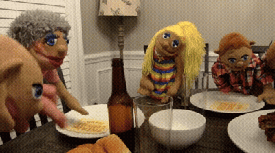 A Bottle Of Beer Sits On A Table Next To A Happy Thanksgiving Plate GIF