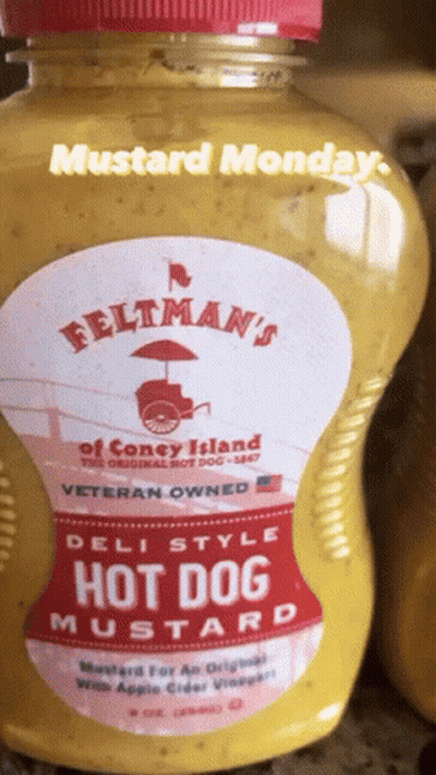 A Bottle Of Feltman 'S Hot Dog Mustard Is On A Counter GIF