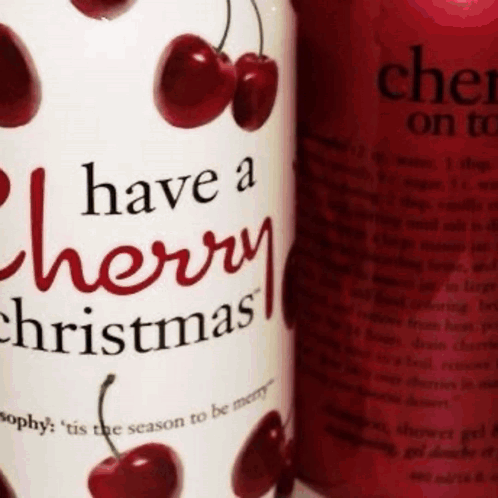 A Bottle Of Have A Cherry Christmas Lotion With Cherries On It GIF