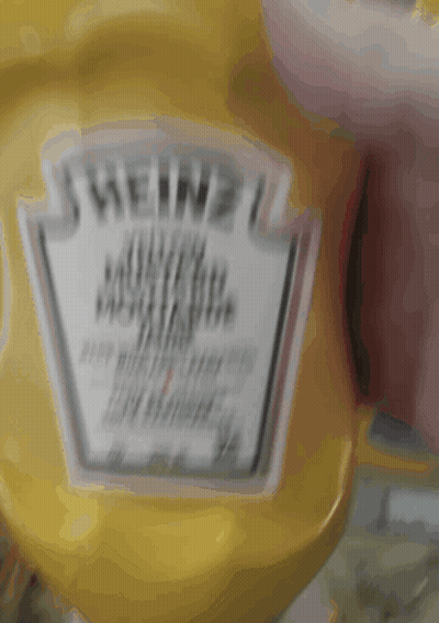 A Bottle Of Heinz Mustard Sits On A Counter GIF