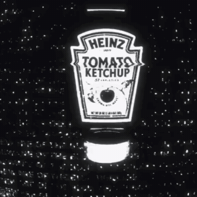 A Bottle Of Heinz Tomato Ketchup Is Surrounded By Stars GIF