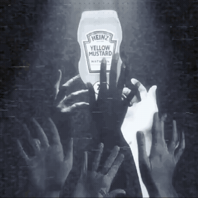 A Bottle Of Heinz Yellow Mustard Is Being Held By A Crowd Of Hands GIF