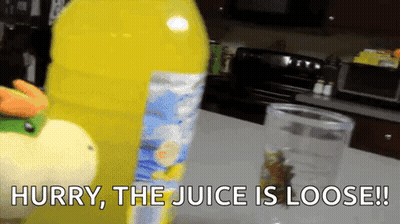 A Bottle Of Juice Is Sitting On A Counter With The Words Hurry The Juice Is Loose Written On It GIF