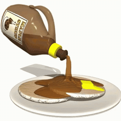 A Bottle Of Maple Syrup Is Being Poured Over A Pancake GIF
