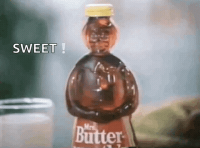 A Bottle Of Mrs. Butter Is Sitting On A Table Next To A Jar GIF