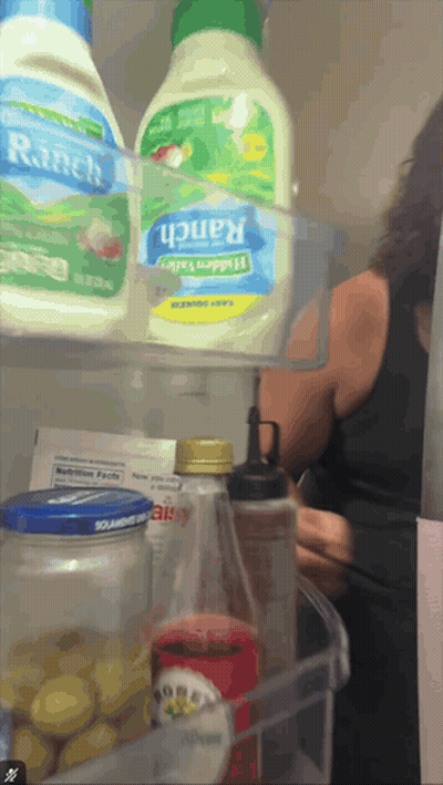 A Bottle Of Ranch Salad Dressing Sits On A Shelf In A Refrigerator GIF