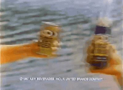 A Bottle Of Root Beer And A Can Of Root Beer GIF