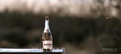 A Bottle Of Smirnoff Is On A Table GIF